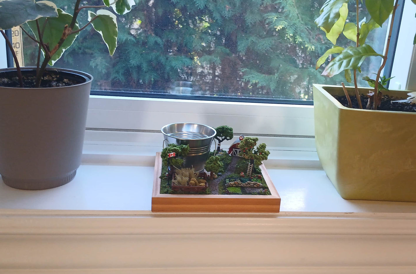 Miniature model farm scene with barn, trees, garden, field and pathways mounted within a wooden base Pot holder, model display, candle holder, diorama
