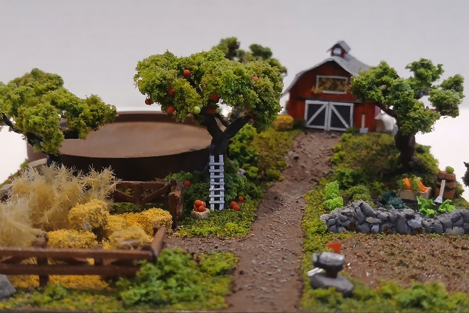 Miniature model farm scene with barn, trees, garden, field and pathways on a wooden plaque Pot holder, model display, candle holder, diorama