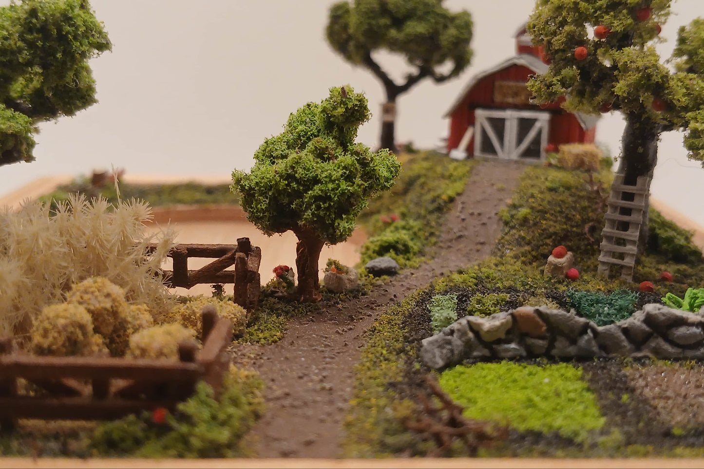 Miniature model farm scene with barn, trees, garden, field and pathways mounted within a wooden base  Pot holder, model display, candle holder, diorama
